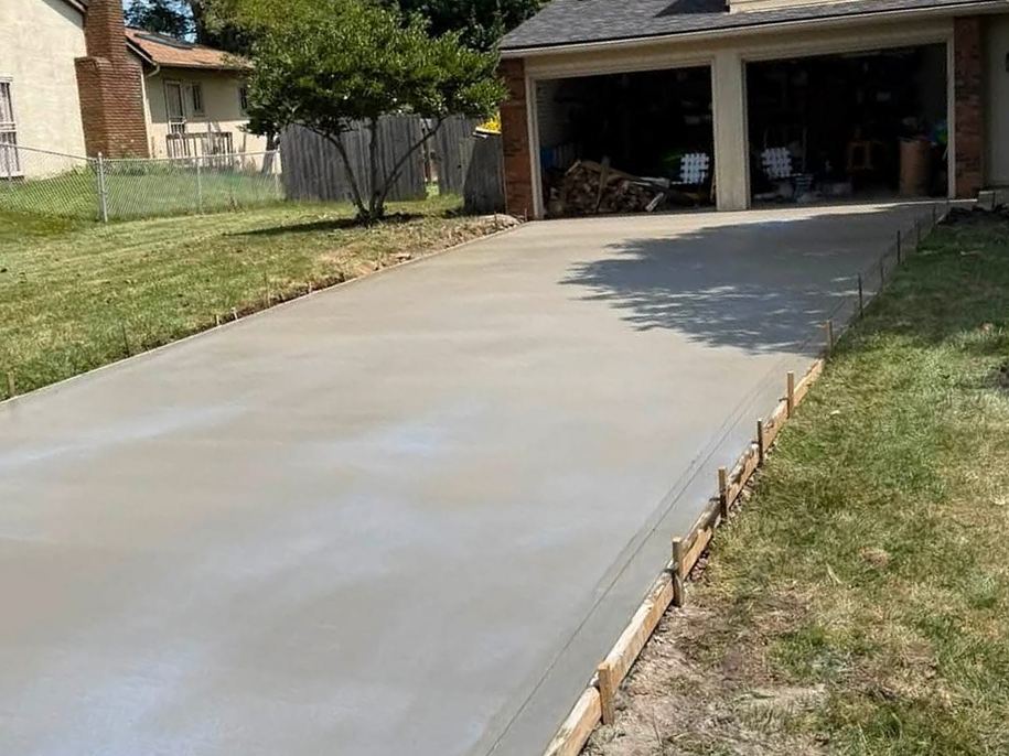New concrete driveway with tooled edges