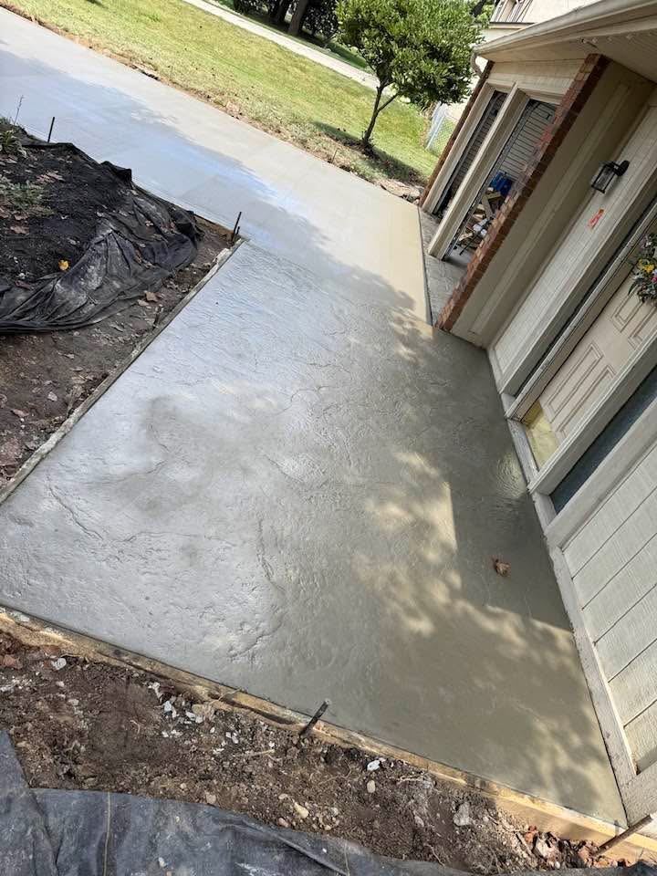 Stamped entry walk. Slate-textured walk from the driveway to the door.